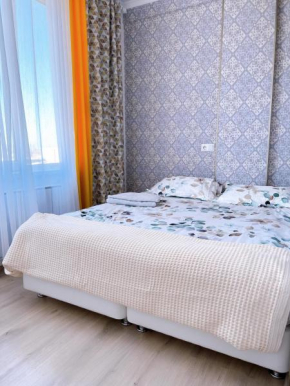 Adorable new 1 bedroom apartment with balcony and view
